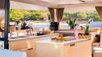 Luxury kitchen and living area inside the Aura 51 catamaran RivieraYachtExperience