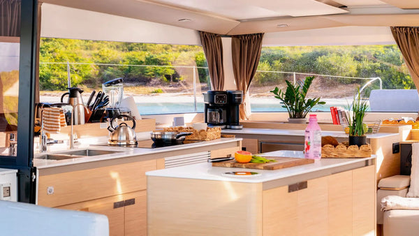 Luxury kitchen and living area inside the Aura 51 catamaran RivieraYachtExperience