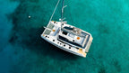 Aura 51 luxury yacht charter in crystal clear turquoise water RivieraYachtExperience